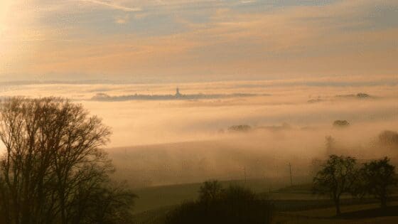 view of misty autumn hills