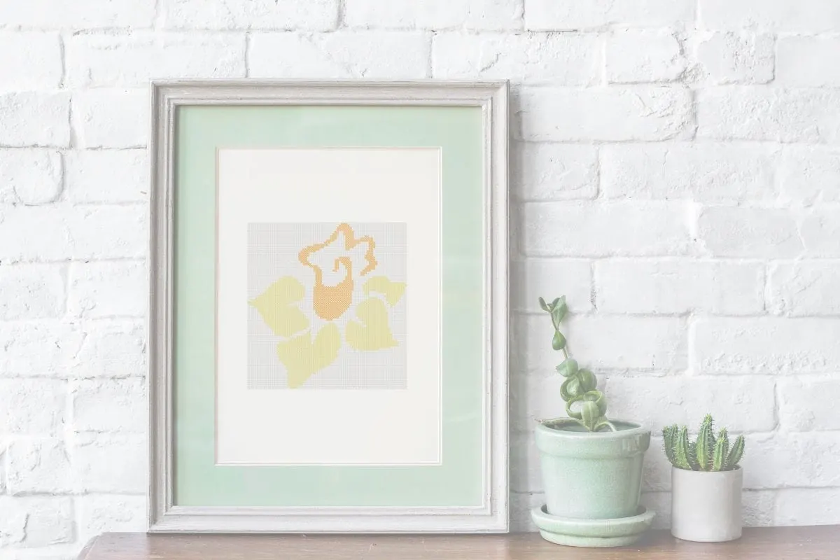 embroidered and framed daffodil cross stitch