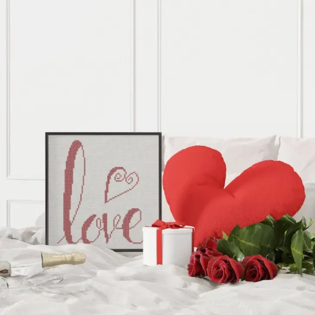 embroidered and framed handwritten love cross stitch
