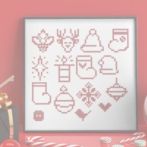 embroidered and framed set of Red Christmas cross stitch Motifs