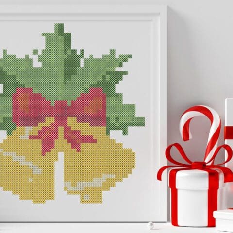 embroidered and framed christmas bells cross stitch