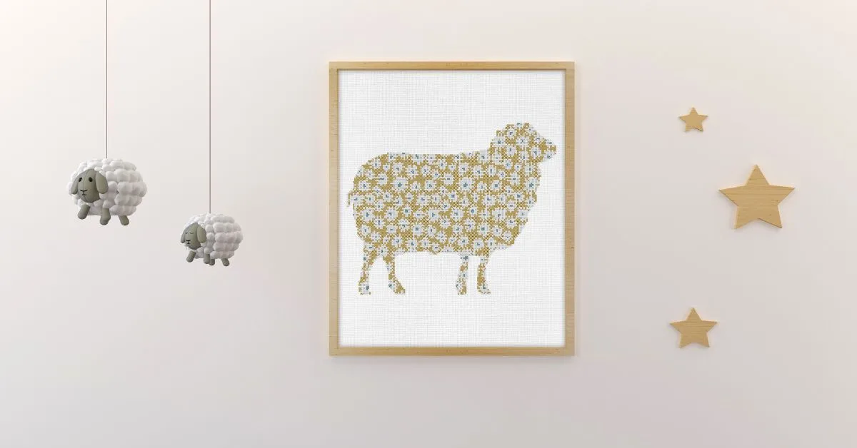 embroidered and framed daisy sheep cross stitch