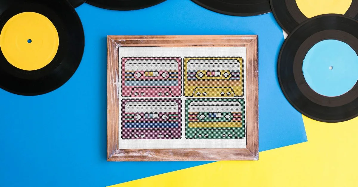 embroidered and framed cassette tapes cross stitch