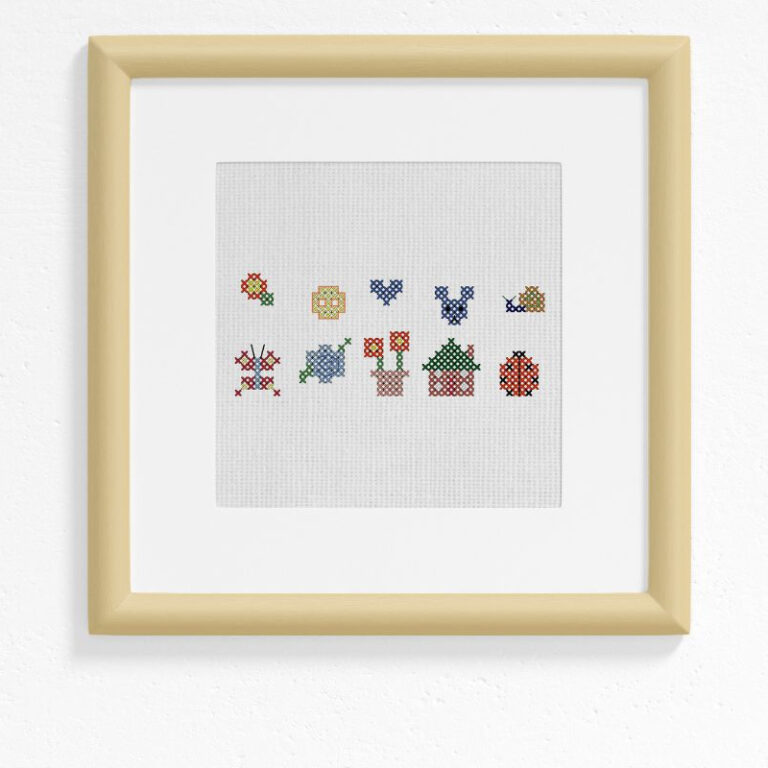 embroidered and framed 10 tiny cross stitch motifs