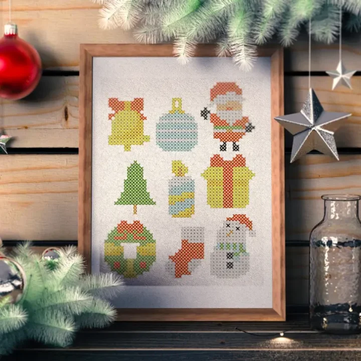 embroidered and framed 9 small Christmas cross stitch patterns