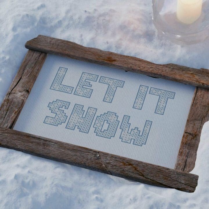 embroidered and framed let it snow cross stitch pattern