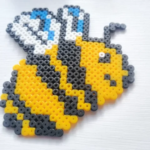 close up of a cute bee made of perler beads