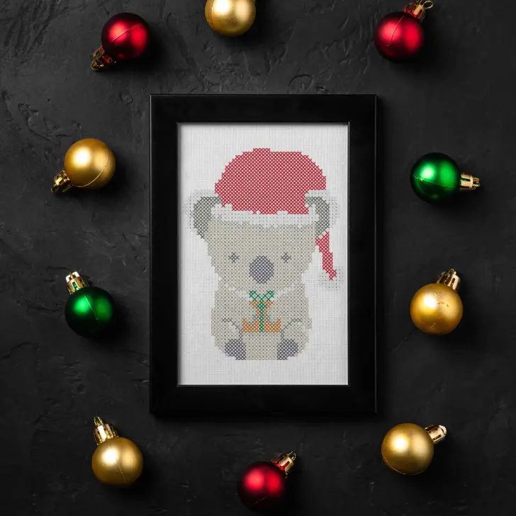 embroidered and framed christmas koala cross stitch