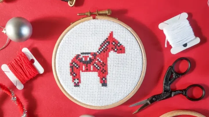 embroidered and framed christmas dala horse cross stitch