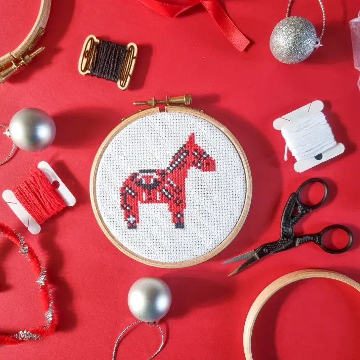 embroidered and framed christmas dala horse cross stitch