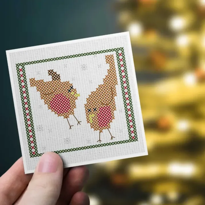embroidered and made into a card pair of robins cross stitch