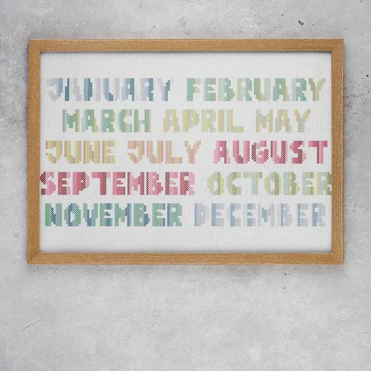 embroidered and framed temperature tracker cross stitch for the year