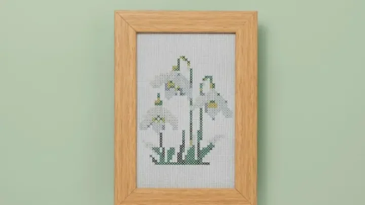 framed and embroidered cross stitch snowdrops