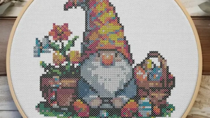 embroidered and framed in a hoop easter gnome cross stitch