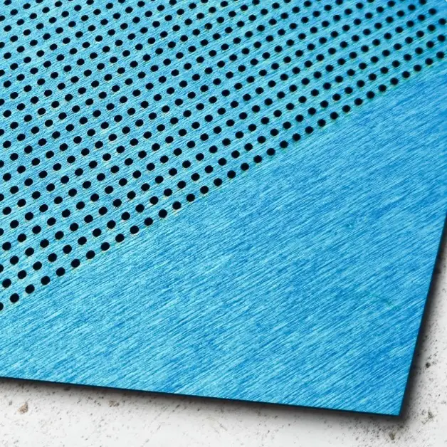close up of a laser cut wooden pennant used for cross stitch
