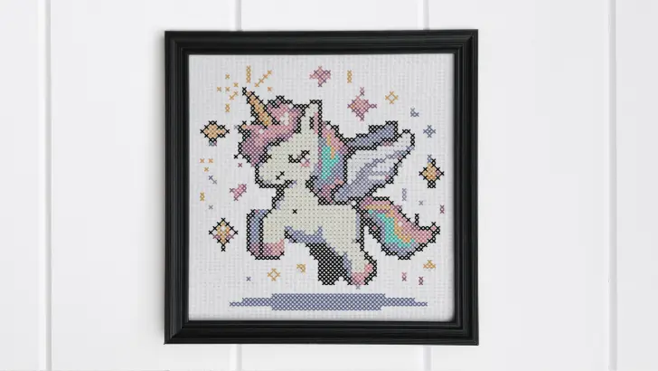 framed and embroidered Pegasus cross stitch