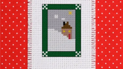 Image for winter cottage cross stitch pattern (free)