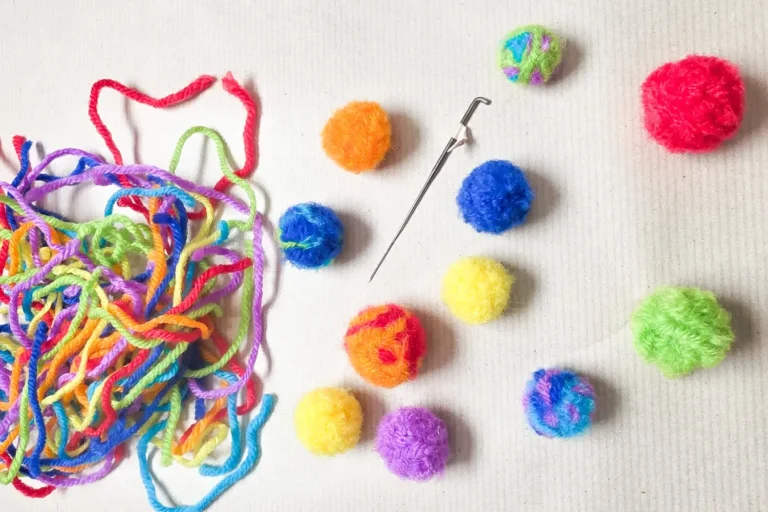 DIY yarn scrap pom poms